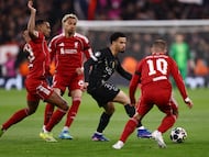 Soccer Football - UEFA Champions League - Quarter Final - Second Leg - Liverpool v Paris St Germain - Anfield, Liverpool, Britain - April 14, 2026 Paris St Germain's Warren Zaire-Emery in action with Liverpool's Ryan Gravenberch and Alexis Mac Allister Action Images via Reuters/Lee Smith