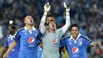 BOGOTA, COLOMBIA - MARCH 2: Luis Delgado (C) of Millonarios celebrates a goal against Santa Fe during a match between Millonarios and Santa Fe as part of the Liga Postobon 2014 at Nemesio Camacho El Campin Stadium on MARCH 2, 2014 in Bogota, Colombia. (Photo by Gabriel Aponte/LatinContent via Getty Images)