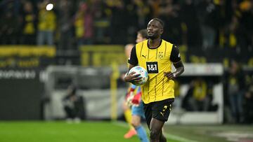 Dortmund's Guinean forward #09 Serhou Guirassy celebratres after scoring the 4-0 goal during the German first division Bundesliga football match between BVB Borussia Dortmund and 1 FC Union Berlin in Dortmund, western Germany, on February 22, 2025. (Photo by INA FASSBENDER / AFP) / DFL REGULATIONS PROHIBIT ANY USE OF PHOTOGRAPHS AS IMAGE SEQUENCES AND/OR QUASI-VIDEO