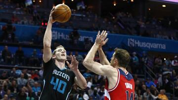 Mar 18, 2017; Charlotte, NC, USA; Charlotte Hornets center Cody Zeller (40) shoots the ball over Washington Wizards forward Jason Smith (14) in the second half at Spectrum Center. The Hornets defeated the Wizards 98-93. Mandatory Credit: Jeremy Brevard-USA TODAY Sports