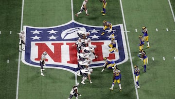 ATLANTA, GEORGIA - FEBRUARY 03: Tom Brady #12 of the New England Patriots prepares to run the play against the Los Angeles Rams during the first quarter during Super Bowl LIII at Mercedes-Benz Stadium on February 03, 2019 in Atlanta, Georgia.   Rob Carr/Getty Images/AFP
 == FOR NEWSPAPERS, INTERNET, TELCOS &amp; TELEVISION USE ONLY ==