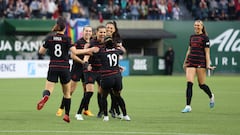 Apr 22, 2023; Portland, Oregon, USA; Portland Thorns FC forward Christine Sinclair (12) celebrates with teammates after scoring a goal during the first half against Racing Louisville FC at Providence Park. Mandatory Credit: Craig Mitchelldyer-USA TODAY Sports