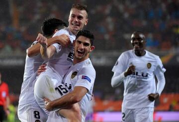 Valencia's Lato (second left) celebrates scoring the opening goal in Los Che's Europa League quarter-final win over Villarreal at Mestalla.