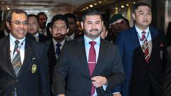 (FILES) In this file photo taken on March 25, 2017, newly appointed President for the Football Association of Malaysia (FAM) Tunku Ismail Sultan Ibrahim (C) arrives for the FAM annual congress meeting at a hotel in Kuala Lumpur. - Tunku Ismail Sultan Ibra