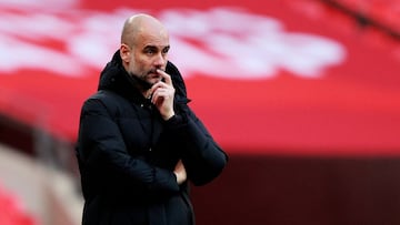 LONDON, ENGLAND - APRIL 17: Pep Guardiola, Manager of Manchester City  looks on  during the Semi Final of the Emirates FA Cup match between Manchester City and Chelsea FC at Wembley Stadium on April 17, 2021 in London, England. Sporting stadiums around th