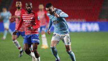 GRANADA, SPAIN - JANUARY 31: Iago Aspas of Celta Vigo runs with the ball during the La Liga Santander match between Granada CF and RC Celta at Estadio Nuevo Los Carmenes on January 31, 2021 in Granada, Spain. Sporting stadiums around Spain remain under st