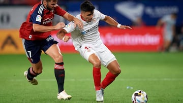 Marcos Acuña Left-Back of Sevilla and Argentina and Jon Moncayola Central Midfield of Osasuna and Spain compete for the ball during the La Liga Santander match between CA Osasuna and Sevilla FC at El Sadar Stadium on August 12, 2022 in Pamplona, Spain. (Photo by Jose Breton/Pics Action/NurPhoto via Getty Images)