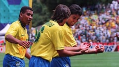 (FILES) Photo taken on June 24, 1994 of Brazilian forward Bebeto (R), imitated by Leonardo, celebrating his goal against Cameroon as Mauro Silva looks on during their World Cup first round soccer match in Stanford. Bebeto's goal and celebration, dedicated to his newborn son, helped Brazil win 3-0.     
AFP PHOTO/PATRICK HERTZOG
