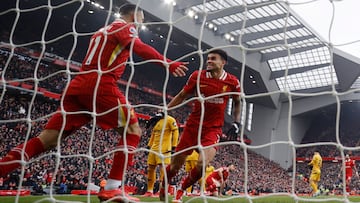Soccer Football - Premier League - Liverpool v Wolverhampton Wanderers - Anfield, Liverpool, Britain - February 16, 2025 Liverpool's Luis Diaz celebrates scoring their first goal with Mohamed Salah REUTERS/Phil Noble EDITORIAL USE ONLY. NO USE WITH UNAUTHORIZED AUDIO, VIDEO, DATA, FIXTURE LISTS, CLUB/LEAGUE LOGOS OR 'LIVE' SERVICES. ONLINE IN-MATCH USE LIMITED TO 120 IMAGES, NO VIDEO EMULATION. NO USE IN BETTING, GAMES OR SINGLE CLUB/LEAGUE/PLAYER PUBLICATIONS. PLEASE CONTACT YOUR ACCOUNT REPRESENTATIVE FOR FURTHER DETAILS..