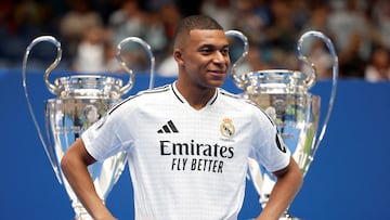 FILE PHOTO: Soccer Football - Real Madrid unveil Kylian Mbappe - Santiago Bernabeu, Madrid, Spain - July 16, 2024 New Real Madrid signing Kylian Mbappe poses for a photograph during the presentation REUTERS/Juan Medina/File Photo