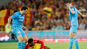 Soccer Football - Ligue 1 - RC Lens v Olympique de Marseille - Stade Bollaert-Delelis, Lens, France - May 6, 2023 RC Lens' Angelo Fulgini in action with Olympique de Marseille's Sead Kolasinac REUTERS/Johanna Geron