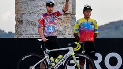 Team Education First rider US Sean Bennett (L) waves on stage at the Doric Temple of Segesta, near Palermo, Sicily, on October 1, 2020 during an opening ceremony of presentation of participating teams and riders, two days ahead of the departure of the Giro d&#039;Italia 2020 cycling race. (Photo by Luca Bettini / AFP)