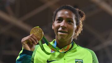 Rafaela Silva of Brazil celebrates after winning the gold medal in the Women's -57 kg Final - Gold Medal Contest on Day 3 of the Rio 2016 Olympic Games at Carioca Arena 2 on August 8, 2016 in Rio de Janeiro, Brazil.