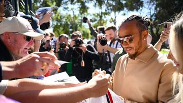 MELBOURNE, AUSTRALIA - APRIL 02: Lewis Hamilton of Great Britain and Mercedes greets fans on the Melbourne Walk prior to the F1 Grand Prix of Australia at Albert Park Grand Prix Circuit on April 02, 2023 in Melbourne, Australia. (Photo by Clive Mason - Formula 1/Formula 1 via Getty Images)