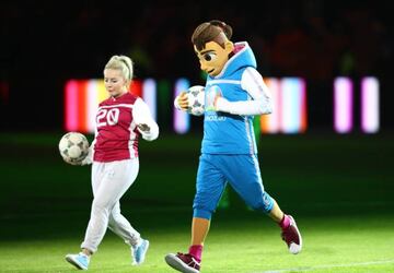 EURO 2020 mascot Skillzy and freestyler Liv Cooke run onto the pitch prior to the 2020 UEFA European Championships Group C qualifying match between Netherlands and Germany at Johan Cruyff Arena