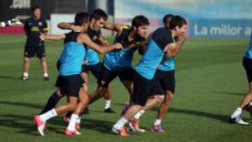 Los jugadores 'culés' se emplean a fondo en la sesión.