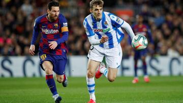 Soccer Football - La Liga Santander - FC Barcelona v Real Sociedad - Camp Nou, Barcelona, Spain - March 7, 2020 Barcelona's Lionel Messi in action with Real Sociedad's Diego Llorente REUTERS/Albert Gea