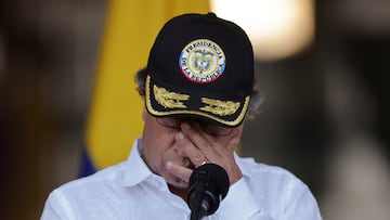 Colombian President Gustavo Petro reacts during a demonstration of planes donated by the United States to the Colombian Police to extinguish fires, at the Police Aviation School in Mariquita, Colombia February 14, 2024. REUTERS/Luisa Gonzalez