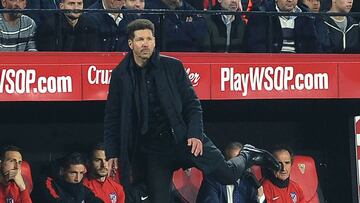 Atletico Madrid's Argentinian coach Diego Simeone reacts during the Spanish 'Copa del Rey' (King's cup) quarter-final second leg football match between Sevilla FC and Club Atletico de Madrid at the Ramon Sanchez Pizjuan stadium in Sevi