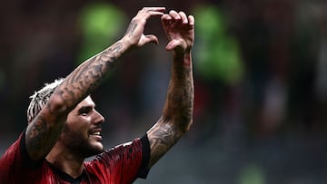 AC Milan's French defender Theo Hernandez celebrates after scoring during the Italian Serie A football match AC Milan vs Torino on August 26, 2023 at the �San Siro Stadium� in Milan. (Photo by MARCO BERTORELLO / AFP)