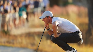 RIDGELAND, SOUTH CAROLINA - OCTOBER 23: Rory McIlroy of Northern Ireland lines up a putt on the 18th green during the final round of the CJ Cup at Congaree Golf Club on October 23, 2022 in Ridgeland, South Carolina.   Kevin C. Cox/Getty Images/AFP