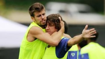 <b>PREPARADO. </b>Piqué con Puyol durante un entrenamiento.