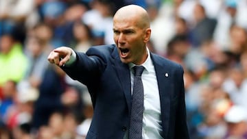 Zinedine Zidane on the touchline during a Real Madrid game.