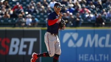 DETROIT, MICHIGAN - OCTOBER 02: Carlos Correa #4 of the Minnesota Twins runs back to the dugout after recording the last out of the seventh inning during a game against the Detroit Tigers at Comerica Park on October 02, 2022 in Detroit, Michigan.   Mike Mulholland/Getty Images/AFP