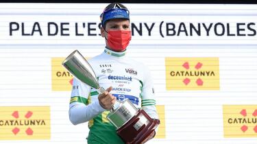 Leader Team Deceuninck rider Portugal's Joao Almeida celebrates on the podium after the second stage of the 100th Volta Catalunya 2021 a 18,5 km Individual time-trial starting and finishing in Banyoles, on March 23, 2021. (Photo by Josep LAGO / AFP)