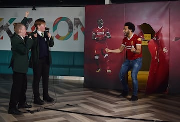 Mohamed Salah of Liverpool surprising school children for a 'Kop Kids' episode at Anfield, Liverpool, England.