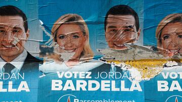 FILE PHOTO: Election posters of the French far-right National Rally (Rassemblement National - RN) party with pictures of their leaders Marine Le Pen and Jordan Bardella are seen near the RN party headquarters before the second round of the early French parliamentary elections, in Paris, France, July 5, 2024. REUTERS/Benoit Tessier/File Photo