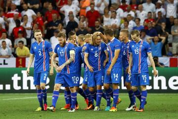 The Iceland team celebrate Sigthorsson's winner in Nice.