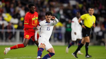 NASHVILLE, TENNESSEE - OCTOBER 17: I�aki Williams #19 of Ghana challenges Johnny Cardoso #15 of United States during the first half of an international friendly match at GEODIS Park on October 17, 2023 in Nashville, Tennessee.   Brett Carlsen/Getty Images/AFP (Photo by Brett Carlsen / GETTY IMAGES NORTH AMERICA / Getty Images via AFP)