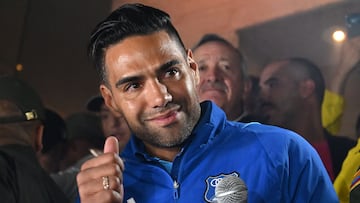 Colombian forward Radamel Falcao Garcia, Who signed for Millonarios FC of Colombia, waves to his supporters after his first training session in Bogota on July 04, 2024. (Photo by Raul ARBOLEDA / AFP)