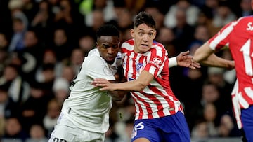 MADRID, SPAIN - JANUARY 26: (L-R) Vinicius Junior of Real Madrid, Nahuel Molina of Atletico Madrid during the Spanish Copa del Rey match between Real Madrid v Atletico Madrid at the Estadio Santiago Bernabeu on January 26, 2023 in Madrid Spain (Photo by David S. Bustamante/Soccrates/Getty Images)