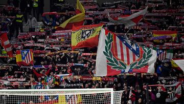 Atletico fans hold their scarves during the Spanish league football match between Club Atletico de Madrid and Deportivo Alaves at the Metropolitano stadium in Madrid on October 29, 2023. (Photo by JAVIER SORIANO / AFP)