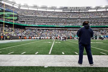 Head coach Bill Belichick of the New England Patriots watches the game from the sidelines during the second half in the game against the New York Jets at MetLife Stadium 