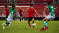 MALLORCA, SPAIN - AUGUST 14: Takefusa Kubo of RCD Mallorca runs with the ball during the La Liga Santader match between RCD Mallorca and Real Betis at Estadio de Son Moix on August 14, 2021 in Mallorca, Spain. (Photo by Rafa Babot/Getty Images)