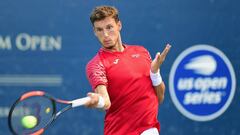 WINSTON-SALEM, NC - AUGUST 21: Pablo Carreno Busta of Spain returns a shot from Franko Skugor of Croatia during their match on day two of the Winston-Salem Open at Wake Forest University on August 21, 2018 in Winston-Salem, North Carolina.   Jared C. Tilton/Getty Images/AFP
 == FOR NEWSPAPERS, INTERNET, TELCOS &amp; TELEVISION USE ONLY ==