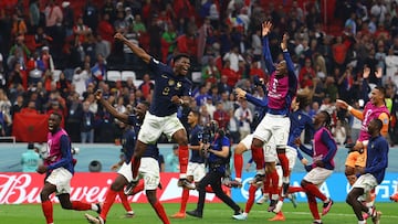 Soccer Football - FIFA World Cup Qatar 2022 - Semi Final - France v Morocco - Al Bayt Stadium, Al Khor, Qatar - December 14, 2022 France's Aurelien Tchouameni, Axel Disasi and teammates celebrate after the match as France reach the final REUTERS/Kai Pfaffenbach