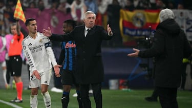 Real Madrid's Spanish defender #17 Lucas Vazquez and Real Madrid's Italian coach Carlo Ancelotti react during the UEFA Champions League football match between Atalanta and Real Madrid at the Gewiss Stadium in Bergamo, on December 10, 2024. (Photo by Alberto PIZZOLI / AFP)