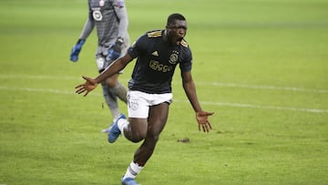 Brian Brobbey of Ajax celebrates his goal while goalkeeper of Lille Mike Maignan is dejected during the UEFA Europa League, round of 32, 1st leg football match between Lille OSC (LOSC) and AFC Ajax Amsterdam on February 18, 2021 at Stade Pierre Mauroy in 