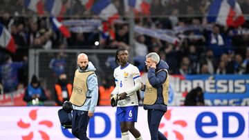 France's midfielder #06 Eduardo Camavinga walks off the pitch after an injury during the friendly football match between France and Chile at the Stade Velodrome in Marseille, southern France, on March 26, 2024. (Photo by NICOLAS TUCAT / AFP)