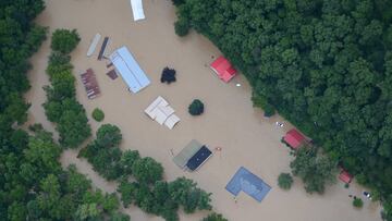 FILE PHOTO: A flooded area is flown over by a Kentucky National Guard helicopter deployed in response to a declared state of emergency in eastern Kentucky, U.S. July 27, 2022. U.S. Army National Guard/Handout via REUTERS/File Photo
