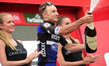 Etixx-Quick Step cyclist Gianluca Brambilla celebrates on the podium after winning the 15th stage of the 71st edition of "La Vuelta" Tour of Spain, a 120km route Sabinanigo to Formigal, on September 4, 2016.