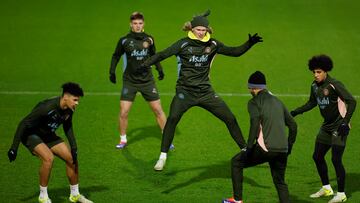 Soccer Football - Champions League - Manchester City Training - Etihad Campus, Manchester, Britain - November 25, 2024 Manchester City's Erling Haaland with Rico Lewis and teammates during training Action Images via Reuters/Jason Cairnduff