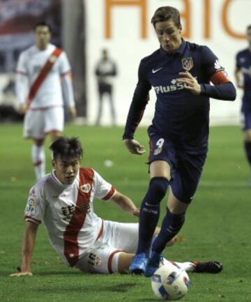 Fernando Torres y Zhang Chengdong.