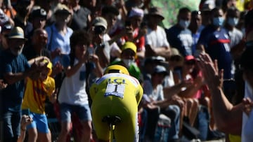 Team UAE Emirates' Tadej Pogacar of Slovenia wearing the overall leader's yellow jersey rides during the 20th stage of the 108th edition of the Tour de France cycling race, a 30 km time trial between Libourne and Saint-Emilion, on July 17, 2021. (Photo by Philippe LOPEZ / AFP)