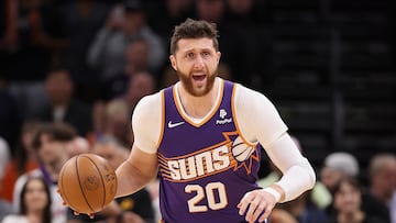 PHOENIX, ARIZONA - MARCH 03: Jusuf Nurkic #20 of the Phoenix Suns handles the ball during the first half of the NBA game at Footprint Center on March 03, 2024 in Phoenix, Arizona. NOTE TO USER: User expressly acknowledges and agrees that, by downloading and or using this photograph, User is consenting to the terms and conditions of the Getty Images License Agreement.   Christian Petersen/Getty Images/AFP (Photo by Christian Petersen / GETTY IMAGES NORTH AMERICA / Getty Images via AFP)