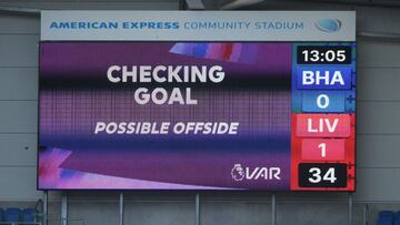 BRIGHTON, ENGLAND - NOVEMBER 28: A screen inside the stadium displays the decision to check VAR for offside after Mohamed Salah of Liverpool scores a goal which is later disallowed during the Premier League match between Brighton &amp; Hove Albion and Liv
